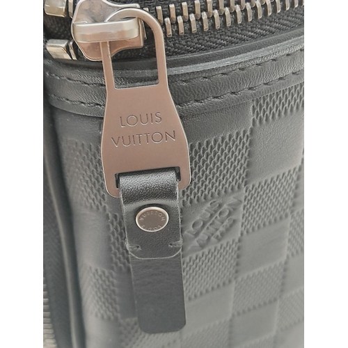 10 - A Louis Vuitton Graphite Michael in Damier Infiniti. High-quality leather iconic checker-board canva... 