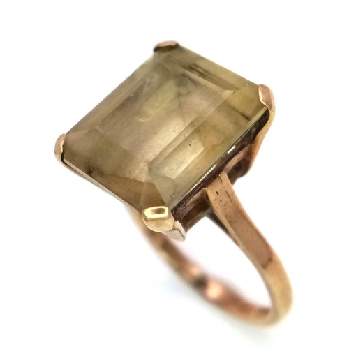 115 - A SMOKEY QUARTZ DRESS RING .   3.9gms   size L