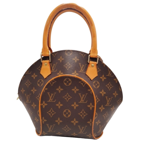 146 - A Louis Vuitton Ellipse Handbag. Monogram canvas exterior with leather trim, the iconic LV padlock, ... 