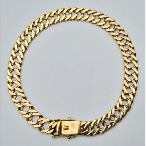 169 - AN 18K GOLD INTERLINK 24cms BRACELET .   28.2gms