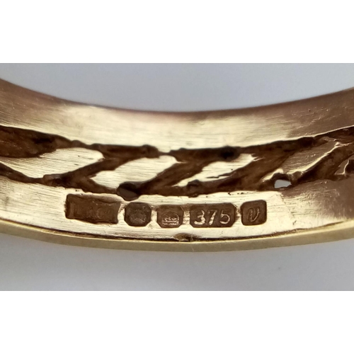 284 - A 9K GOLD RING IN THE SHAPE OF A BELT WITH BUCKLE .   3.4gms   size Q