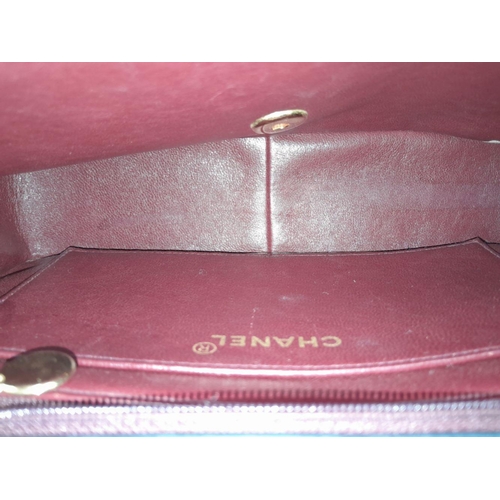 41 - A Classic Vintage Diana Shoulder Bag. Vertical quilted black leather exterior. Gold tone hardware. G... 
