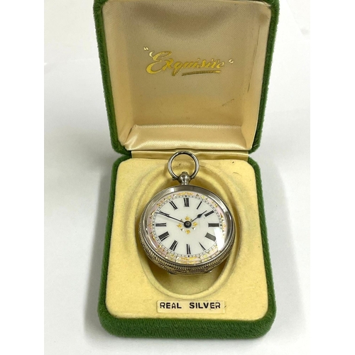 279 - An Antique ladies silver pocket watch , ticks when shaken . Sold as found .