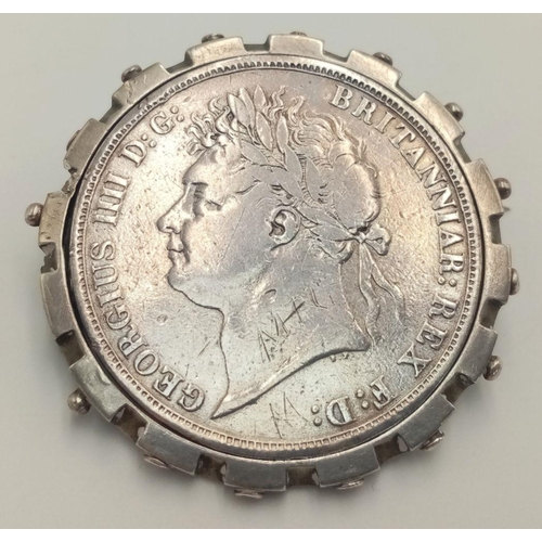 119 - 1821 GEORGE IV SILVER CROWN in Very Fine condition. Mounted in a SILVER cartwheel BROOCH/PENDANT.