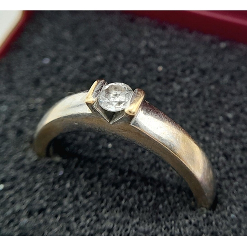 126 - A subtle and understated 18 carat WHITE GOLD and DIAMOND SOLITAIRE RING. Full UK hallmark. 4 grams. ... 
