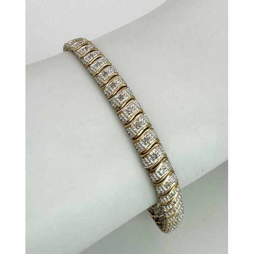 138 - 9K YELLOW GOLD DIAMOND SET BRACELET 7.5G WITH FIGURE 8 SAFETY CATCH

ref: SPAS 3001