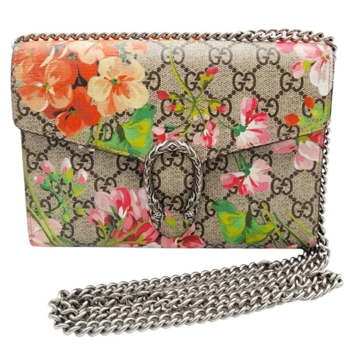 158 - A Gucci Dionysus Chain Wallet. GG supreme blooms decorative textile exterior with antique-style silv... 