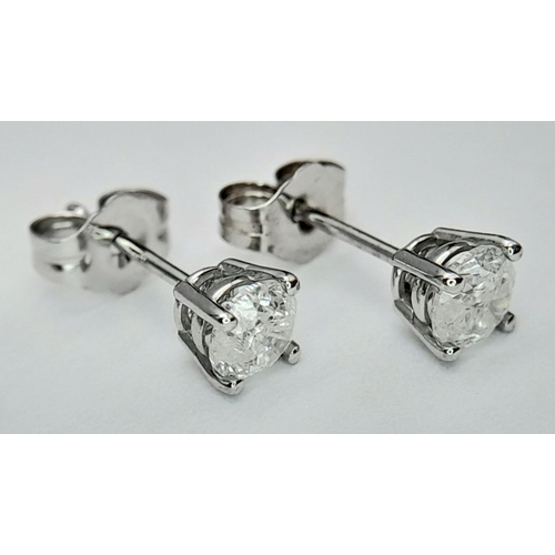 166 - 14K WHITE GOLD DIAMOND SOLITAIRE STUD EARRINGS 0.60CT 0.8G

ref: SC 3024