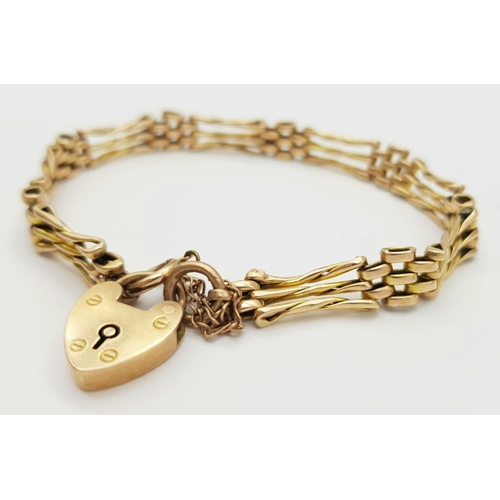 23 - A VINTDE 9K ROSE GOLD GATE BRACELET WITH HEART PADLOCK AND SAFETY CHAIN , IN LOVELY CONDITION FOR AG... 