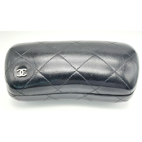 256 - A Pair of Classic Chanel Sunglasses with Case. 017908