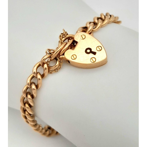 29 - A VINTAGE 9K ROSE GOLD BRACELET WITH HEART PADLOCK .    8.7gms