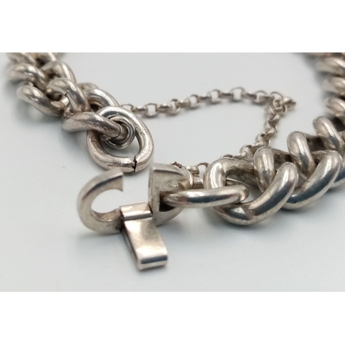 322 - Gentleman’s vintage SOLID SILVER ID BRACELET. Engraved with the name PHIL to front. 45 grams.