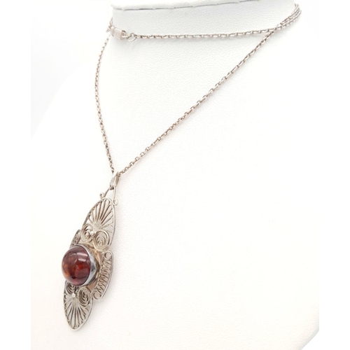 343 - Impressive  AMBER CABOCHON PENDANT set in SILVER FILIGREE and mounted on a SILVER CHAIN NECKLACE. Pe... 