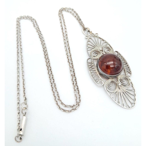 343 - Impressive  AMBER CABOCHON PENDANT set in SILVER FILIGREE and mounted on a SILVER CHAIN NECKLACE. Pe... 