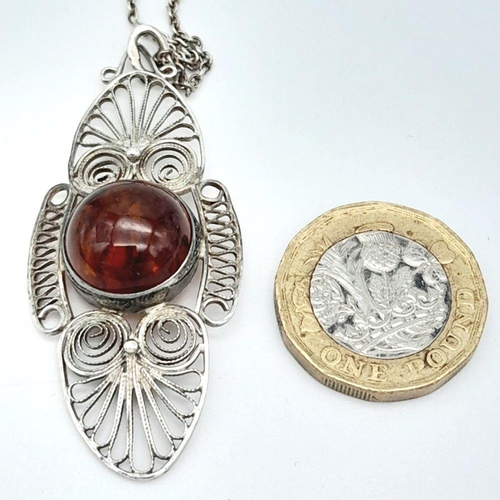 343 - Impressive  AMBER CABOCHON PENDANT set in SILVER FILIGREE and mounted on a SILVER CHAIN NECKLACE. Pe... 