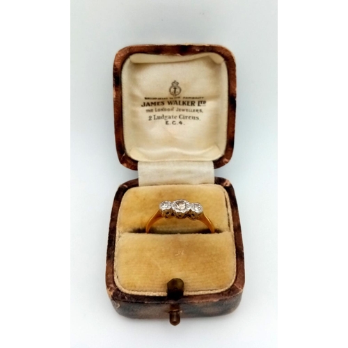 410 - AN  EARLY JAMES WALKER 18K GOLD RING WITH 3 DIAMONDS SET IN PLATINUM IN THE ORIGINAL JAMES WALKER BO... 