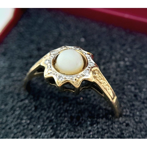 490 - Vintage  9 carat GOLD,PEARL and DIAMOND RING. 1.6 grams. Size N.