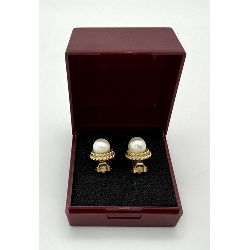 63 - Elegant and classy 9 CARAT GOLD, PEARL EARRINGS. Clip on style with CENTRE PEARL  and  Double GOLD R... 