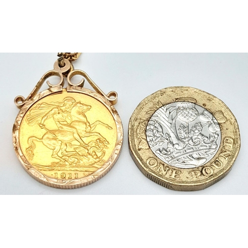 9 - A 22K GOLD FULL SOVEREIGN IN A 9K GOLD SETTING AND ON A 48cms 9K GOLD FIGARO LINK NECK CHAIN .  13.4... 