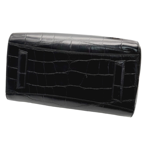 165 - A Givenchy Antigona Hand/Shoulder bag. Croc embossed black leather exterior and silver tone lock dec... 