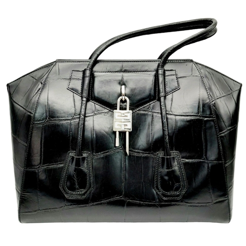 165 - A Givenchy Antigona Hand/Shoulder bag. Croc embossed black leather exterior and silver tone lock dec... 