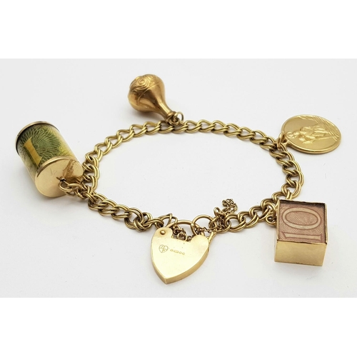21 - Vintage 9 CARAT GOLD CHARM BRACELET. Double link style and complete with GOLD safety chain. Charms t... 