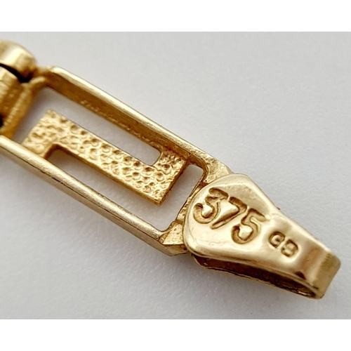 210 - Traditional 9 carat yellow GOLD BRACELET in a GREEK KEY DESIGN. Fully hallmarked. 6.0 grams. 18.5 cm... 