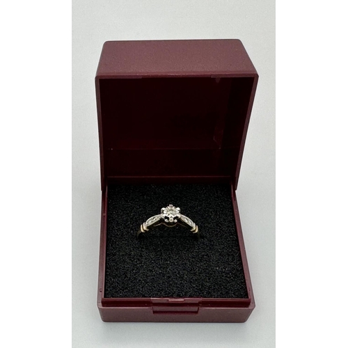 217 - Tasteful 9 carat GOLD and DIAMOND RING. Additional DIAMOND detail to shoulders. Fully hallmarked. Co... 