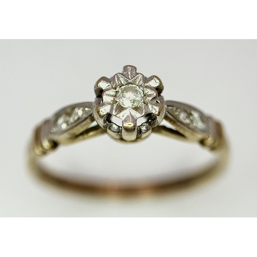 217 - Tasteful 9 carat GOLD and DIAMOND RING. Additional DIAMOND detail to shoulders. Fully hallmarked. Co... 