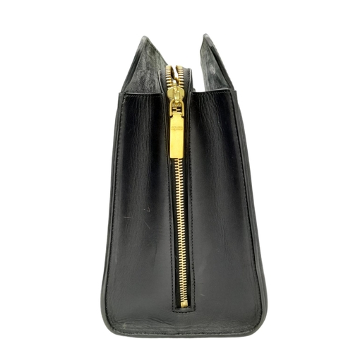 223 - An Alexander McQueen Black Leather Heroine Tote Bag. Gold-tone hardware. Spacious soft textile inter... 