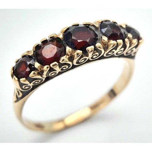 238 - Vintage 9 carat GOLD and GARNET RING. Consisting a sweep of 5 graduated Round Cut GARNETS  set to to... 