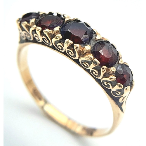 238 - Vintage 9 carat GOLD and GARNET RING. Consisting a sweep of 5 graduated Round Cut GARNETS  set to to... 