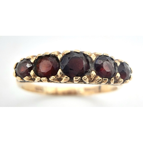 238 - Vintage 9 carat GOLD and GARNET RING. Consisting a sweep of 5 graduated Round Cut GARNETS  set to to... 