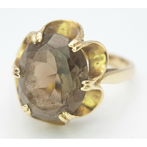 245 - Vintage 9 CARAT GOLD and BROWN AMETHYST RING. Consisting a large (3 carat) oval cushion cut BROWN AM... 