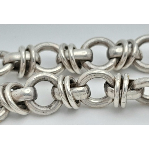 329 - SILVER CHUNKY DESIGNER LINK NECKLACE. Having circular links with SILVER Spacers.  54 grams. 42 cm.