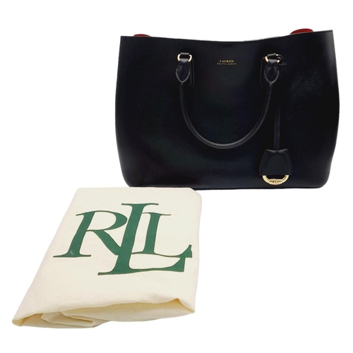 451 - A Ralph Lauren Black Leather Hand/Shoulder Bag. Gold tone hardware. Red leather interior with zipped... 