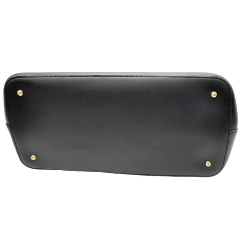 451 - A Ralph Lauren Black Leather Hand/Shoulder Bag. Gold tone hardware. Red leather interior with zipped... 