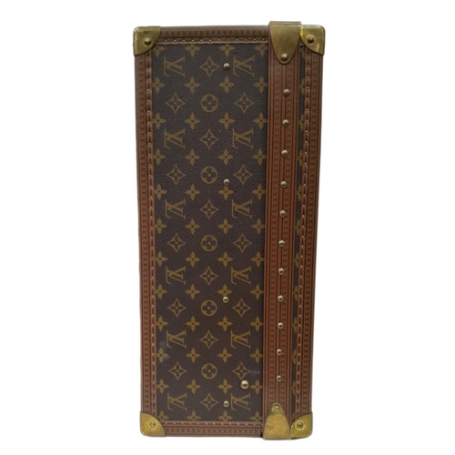 53 - A Vintage Louis Vuitton Trunk/Suitcase. Monogram canvas and brown leather trim exterior. Brass corne... 