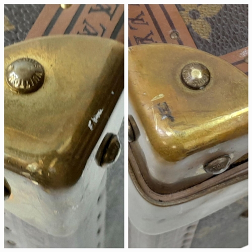 53 - A Vintage Louis Vuitton Trunk/Suitcase. Monogram canvas and brown leather trim exterior. Brass corne... 