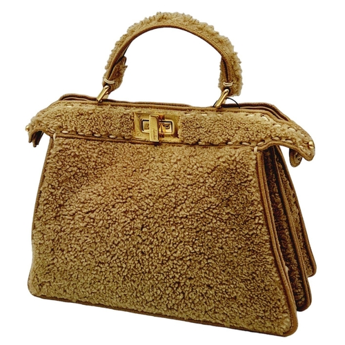 81 - A Fendi Curly Shearling Shiny Nappa Small Peekaboo I SEE U Satchel Bag. Shearling exterior with embr... 