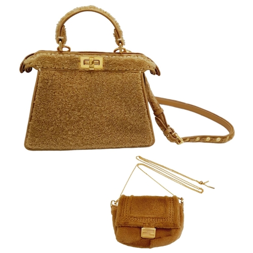 81 - A Fendi Curly Shearling Shiny Nappa Small Peekaboo I SEE U Satchel Bag. Shearling exterior with embr... 