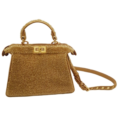 81 - A Fendi Curly Shearling Shiny Nappa Small Peekaboo I SEE U Satchel Bag. Shearling exterior with embr... 