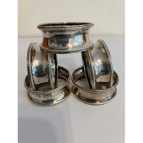 336 - 5 x antique SILVER SERVIETTE/NAPKIN RINGS. Having Bead Borders with clear hallmark for P. Bash, Birm... 