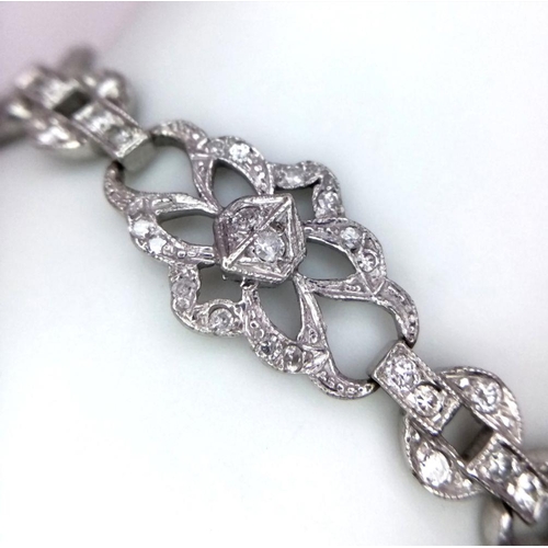 127 - An Art Deco Platinum and Diamond Bracelet. Old cut diamonds - 3ctw. 17.3g total weight. 18cm length.