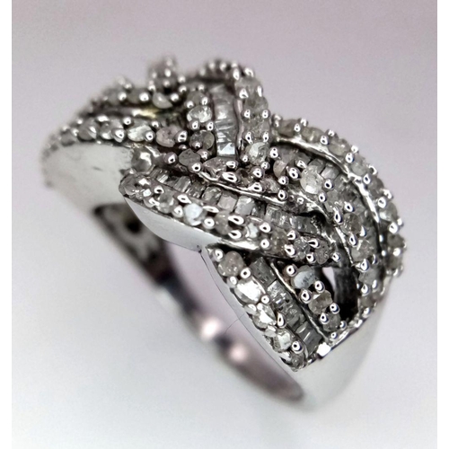 388 - A Sterling Silver Diamond Set Knot Style Cluster Ring Size O. The Crown Measures 1.2cm Wide. Gross W... 