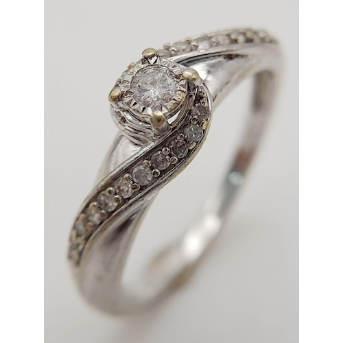 516 - 9K WHITE GOLD DIAMOND RING 0.17CT 2.5G SIZE M

ref: SPAS 3008