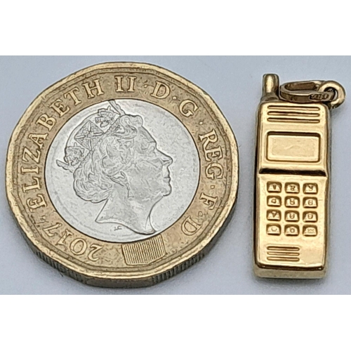 1134 - 9K YELLOW GOLD MOBILE PHONE CHARM 0.8G

ref: SC 3004