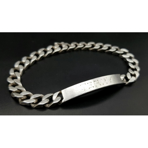 1398 - A vintage Solid Silver 925 Identity Bracelet, 33.3 grams, 22.5cm, inscribed with the name 
