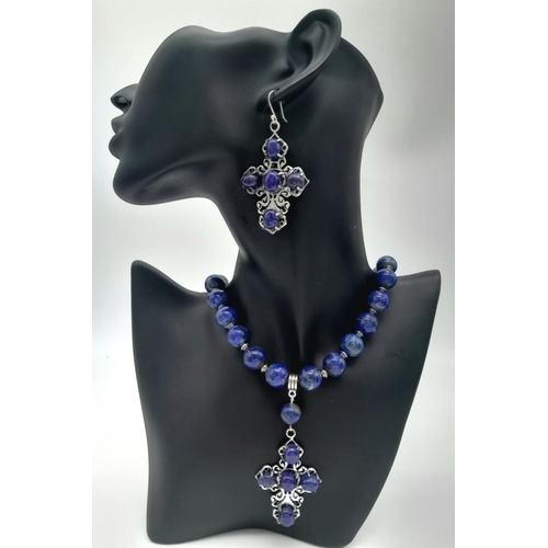 140 - A sterling silver and genuine lapis lazuli necklace and earrings set with large cross shaped pendant... 