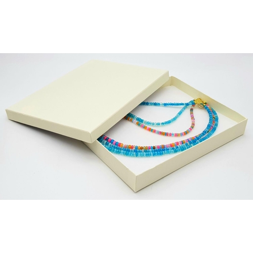 154 - A three-row necklace consisting of faceted opal beads predominantly with blue hues. Length: 43-48 cm... 